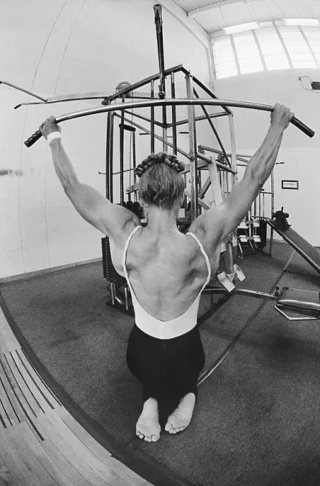 Framed Print : Female Bodybuilder Working out on Weights Framed Print : Female Bodybuilder Working out on Weights