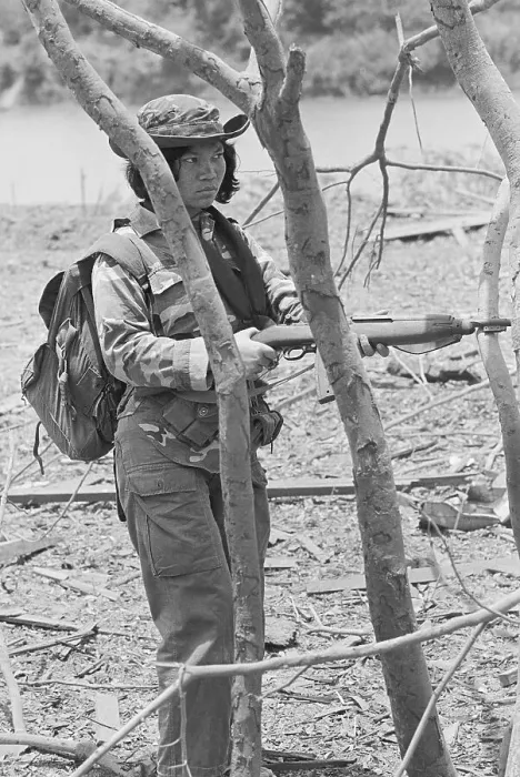 Framed Print : Female Cambodian Soldier Holding Gun Framed Print : Female Cambodian Soldier Holding Gun