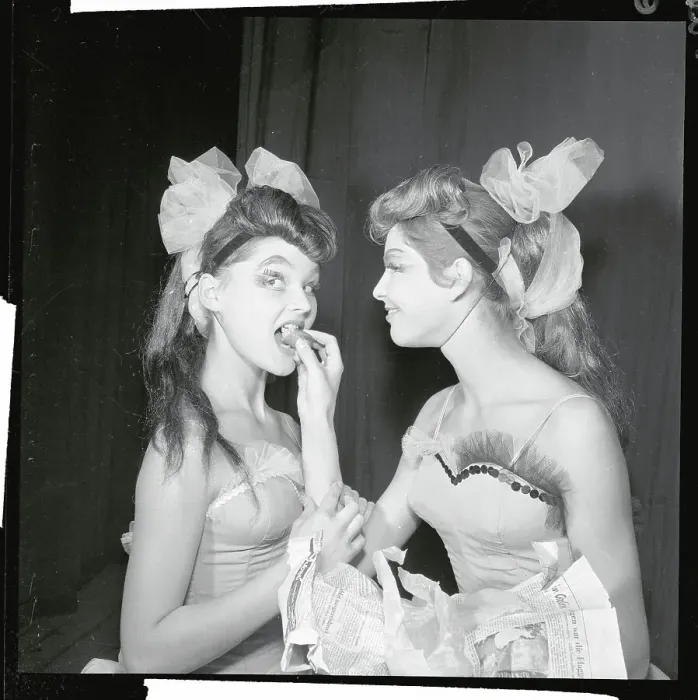 Framed Print : Female Dancer Hand Feeding Another Framed Print : Female Dancer Hand Feeding Another