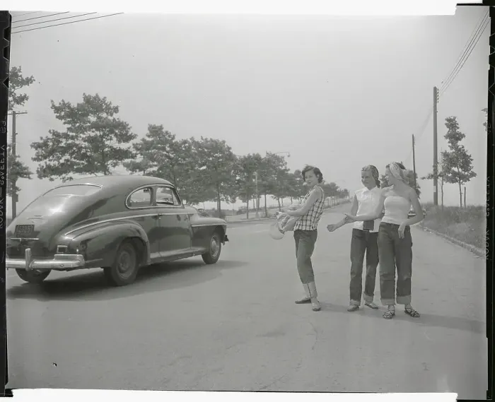 Framed Print : Female Hitchhikers Receiving a Ride Framed Print : Female Hitchhikers Receiving a Ride