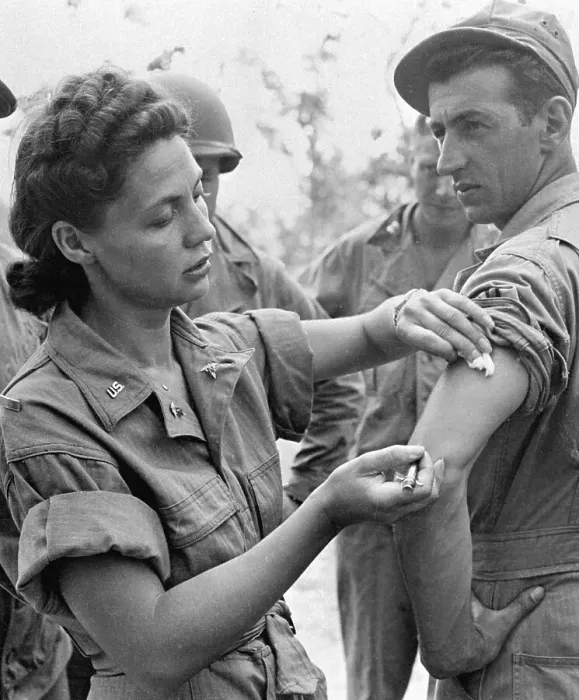 Framed Print : Female Lieutenant Giving Injection to Soldier Framed Print : Female Lieutenant Giving Injection to Soldier
