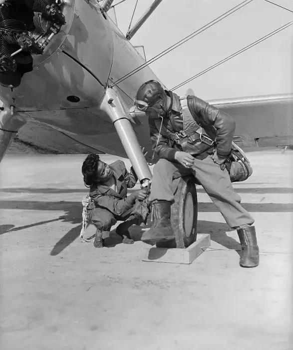Framed Print : Female Mechanic Working on Plane Framed Print : Female Mechanic Working on Plane