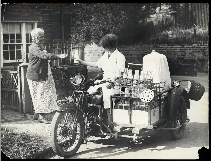 Framed Print : Female Milk Dealer on Motorbike with Sidecar Framed Print : Female Milk Dealer on Motorbike with Sidecar
