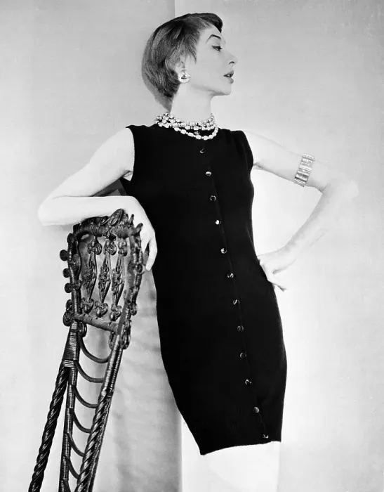 Framed Print : Female Model Posing Against Chair