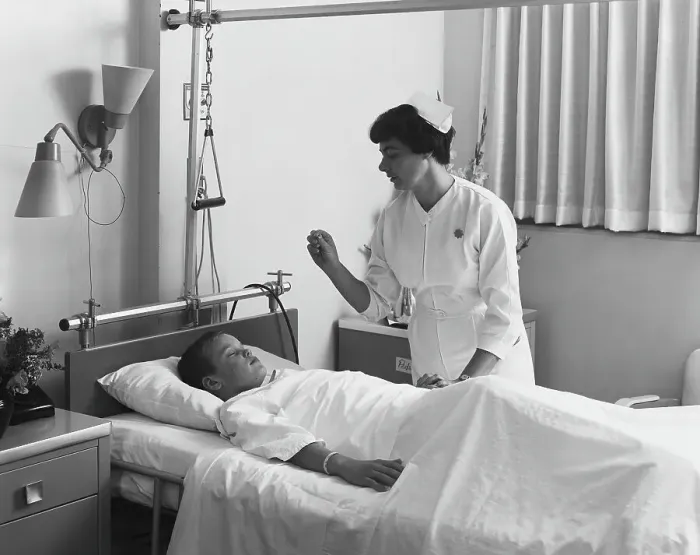 Framed Print : Female nurse checking boy's temperature Framed Print : Female nurse checking boy's temperature