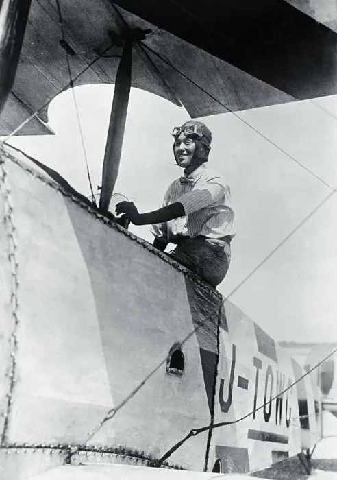 Framed Print : Female Pilot Posing in Her Airplane Framed Print : Female Pilot Posing in Her Airplane