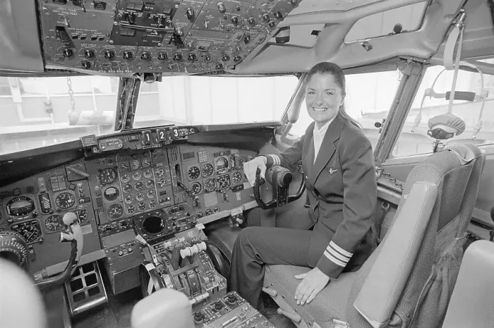 Framed Print : Female Pilot Sitting in Airplane Cockpit Framed Print : Female Pilot Sitting in Airplane Cockpit