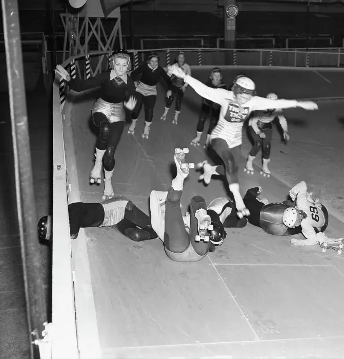 Framed Print : Female Roller Skaters Jumping over Less Fortunate Racers Framed Print : Female Roller Skaters Jumping over Less Fortunate Racers