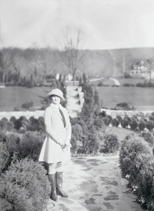 Framed Print : Female Socialite Posing Outdoors Framed Print : Female Socialite Posing Outdoors