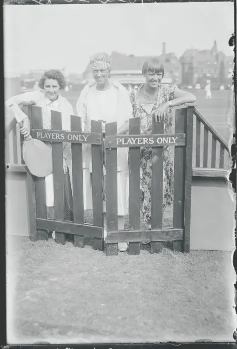 Framed Print : Female Tennis Champions Posing by Fence Framed Print : Female Tennis Champions Posing by Fence