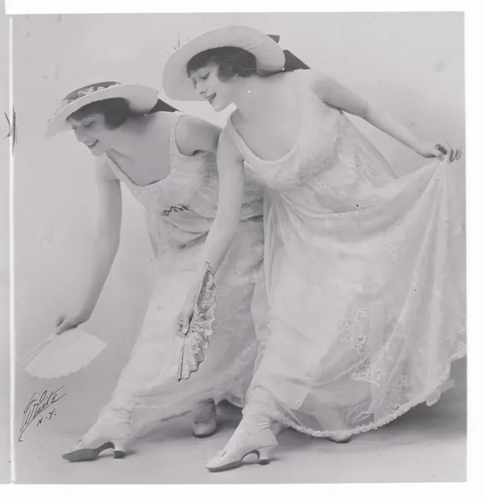 Framed Print : Femininely Dressed Dolly Sisters Bowing Framed Print : Femininely Dressed Dolly Sisters Bowing
