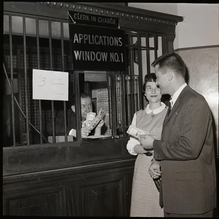 Framed Print : Fiances Pay Marriage License Fee at Window Framed Print : Fiances Pay Marriage License Fee at Window