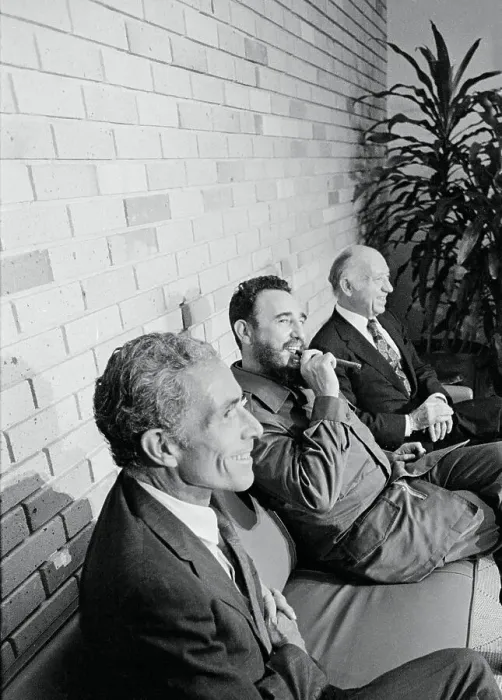 Framed Print : Fidel Castro Smiling and Smoking Cigar in Between American Delegates Framed Print : Fidel Castro Smiling and Smoking Cigar in Between American Delegates
