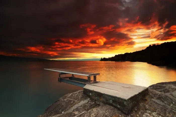 Framed Print : Fiery sunset over a diving board along Lake LA man Framed Print : Fiery sunset over a diving board along Lake LA man