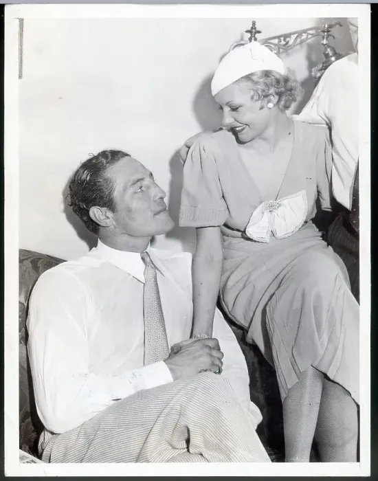 Framed Print : Fighter and Actress Seated Together Framed Print : Fighter and Actress Seated Together