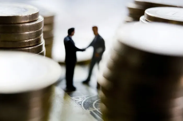 Framed Print : Figures of managers between euro coins Framed Print : Figures of managers between euro coins