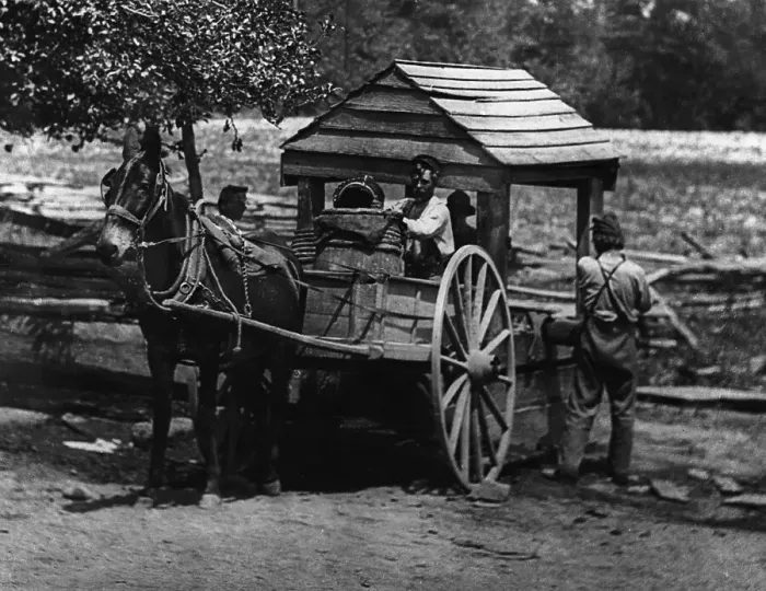 Framed Print : Filling water barrels from a well Framed Print : Filling water barrels from a well