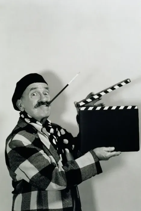 Framed Print : FILM DIRECTOR HOLDING CLAPBOARD Framed Print : FILM DIRECTOR HOLDING CLAPBOARD