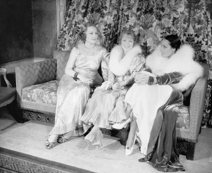 Framed Print : Film Stars Posing on Couch Framed Print : Film Stars Posing on Couch