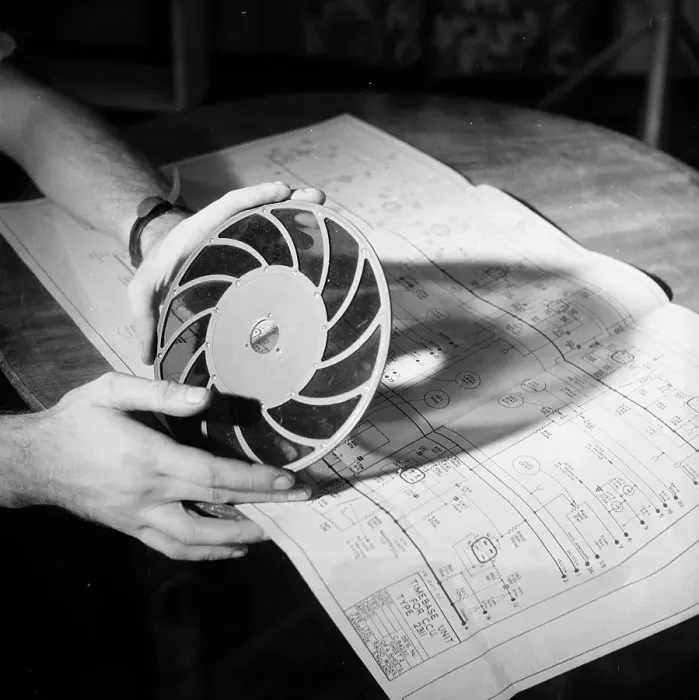 Framed Print : Filter. 13th March 1954: A close-up of a technician holding up a filter Framed Print : Filter. 13th March 1954: A close-up of a technician holding up a filter