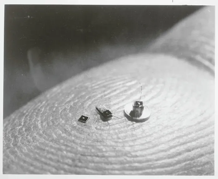 Framed Print : Finger Holding Microscopic Particles Framed Print : Finger Holding Microscopic Particles