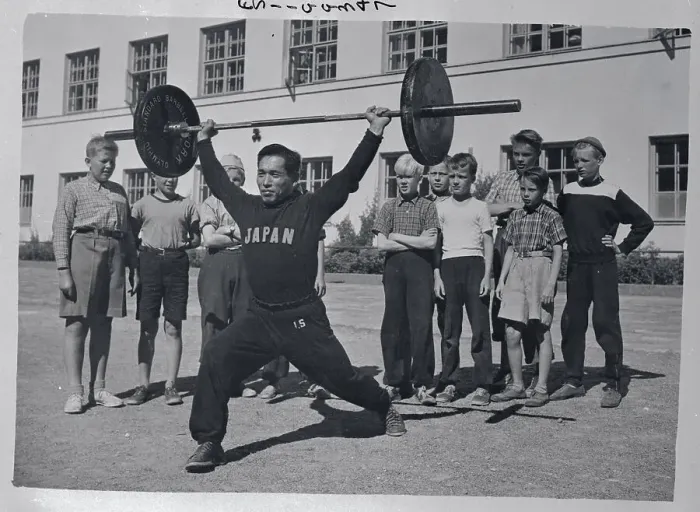 Framed Print : Finnish Observers Watching Japanese Weight Lifter Framed Print : Finnish Observers Watching Japanese Weight Lifter