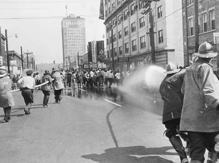 Framed Print : Firemen Spraying Protesters With Firehose Framed Print : Firemen Spraying Protesters With Firehose