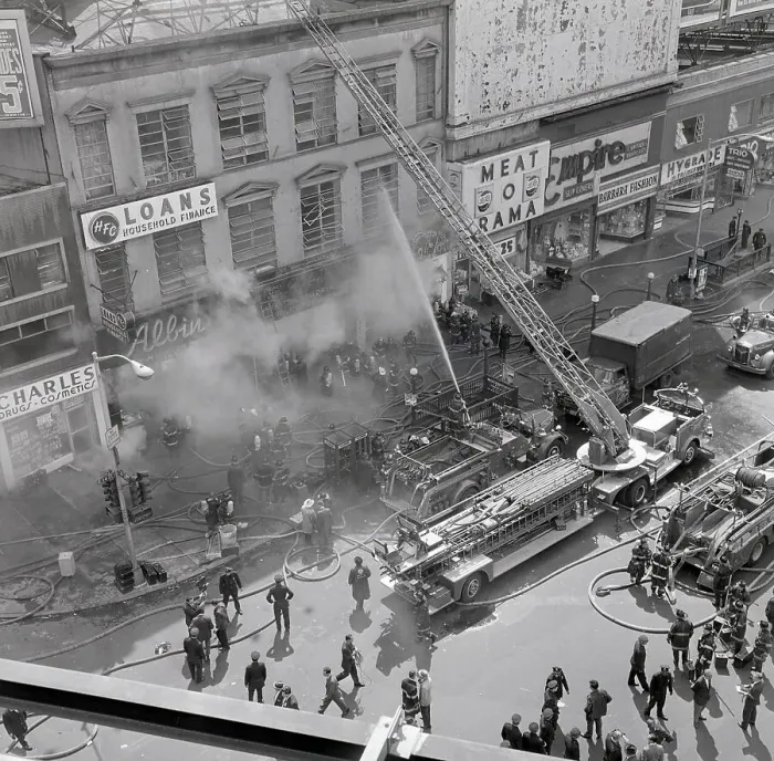 Framed Print : Firetruck Pouring Water into Building Framed Print : Firetruck Pouring Water into Building
