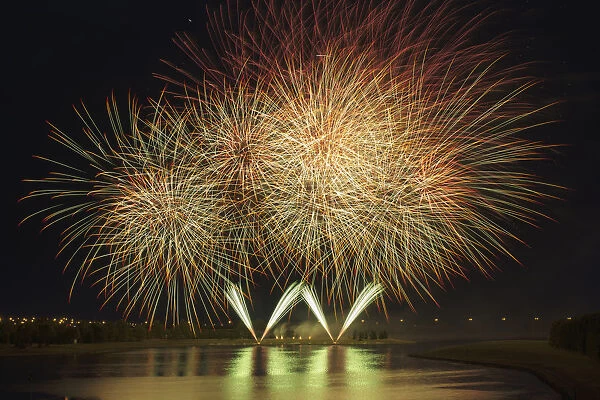 Fireworks reflecting on a lake