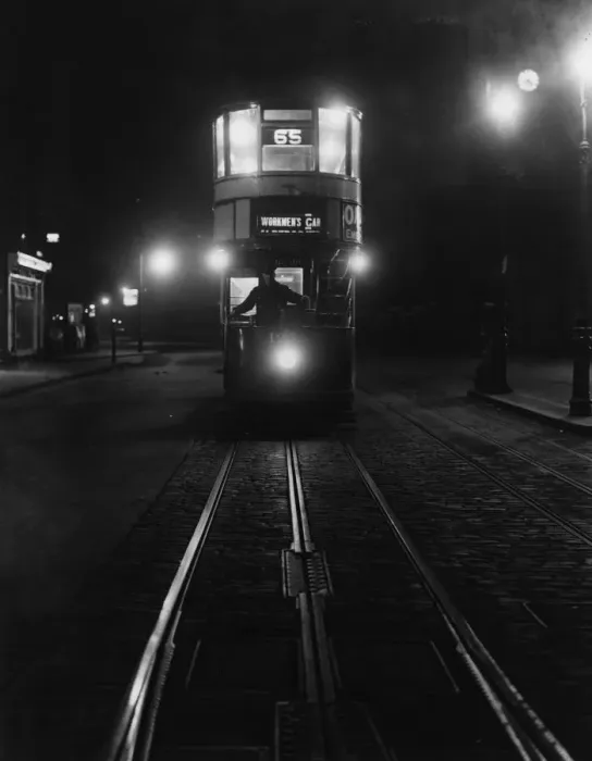 Framed Print : First Up. circa 1929: An early morning Workmans tram on route No 65, travelling Framed Print : First Up. circa 1929: An early morning Workmans tram on route No 65, travelling