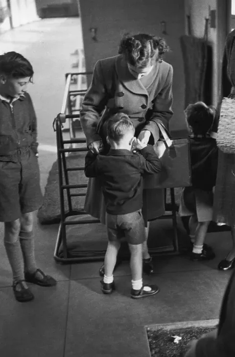 Framed Print : First Day. A five-year-old boy seeks comfort from his mother on his first Framed Print : First Day. A five-year-old boy seeks comfort from his mother on his first
