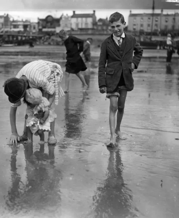 Framed Print : First Dip. June 1925: Children having fun on the beach at Southend Framed Print : First Dip. June 1925: Children having fun on the beach at Southend