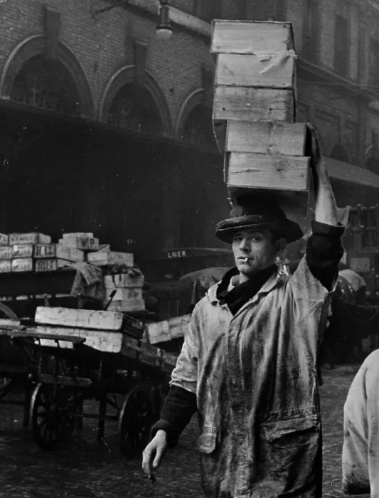 Framed Print : Fish Head. 22nd April 1939: A porter at Billingsgate fish market in London, carries a load Framed Print : Fish Head. 22nd April 1939: A porter at Billingsgate fish market in London, carries a load