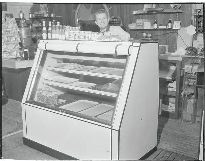Framed Print : Fish Market Owner Posing by Partially Empty Case Framed Print : Fish Market Owner Posing by Partially Empty Case