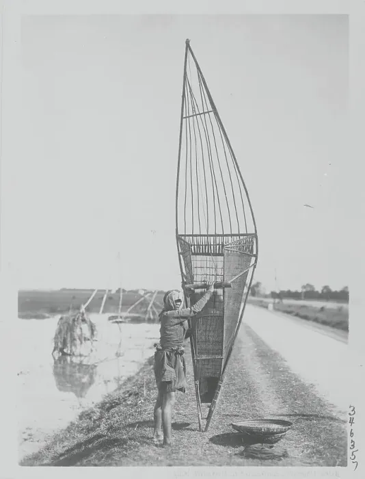 Framed Print : Fisherman. (Original Caption). Indochina: Photo shows a native fisherman Framed Print : Fisherman. (Original Caption). Indochina: Photo shows a native fisherman