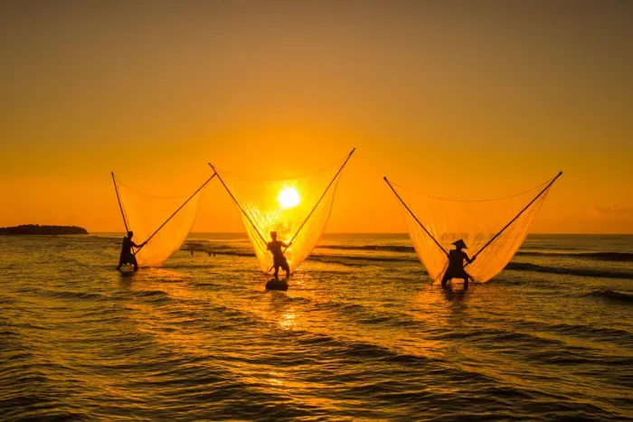 Framed Print : Three fisherman with golden fishing net, sun, dawn, Vietnam Framed Print : Three fisherman with golden fishing net, sun, dawn, Vietnam