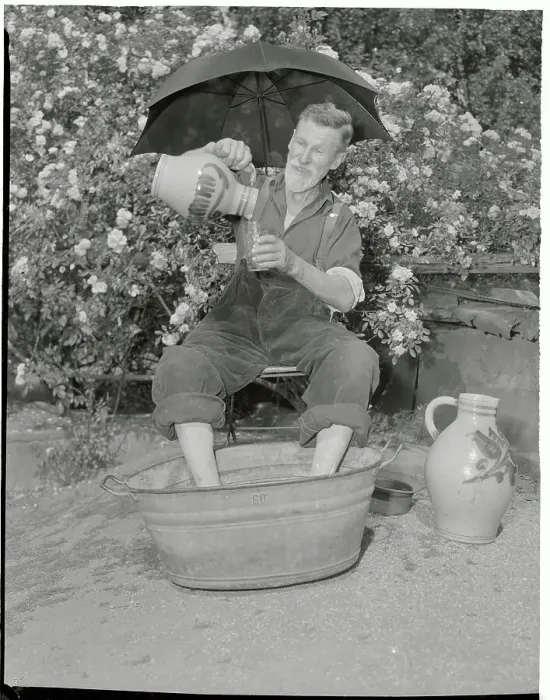 Framed Print : Fisherman Pouring Himself a Drink Framed Print : Fisherman Pouring Himself a Drink
