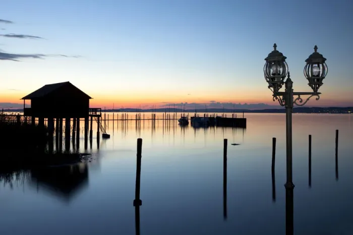 Framed Print : Fishermans hut with a lantern on Lake Constance near Altnau, Switzerland, Europe Framed Print : Fishermans hut with a lantern on Lake Constance near Altnau, Switzerland, Europe
