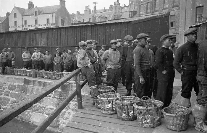 Framed Print : Fishermen. 17th August 1946: Fishermen with samples of their catch in baskets Framed Print : Fishermen. 17th August 1946: Fishermen with samples of their catch in baskets