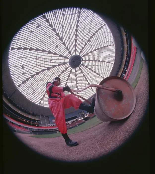 Framed Print : Fisheye View of a Grounds Keeper Working at a Stadium