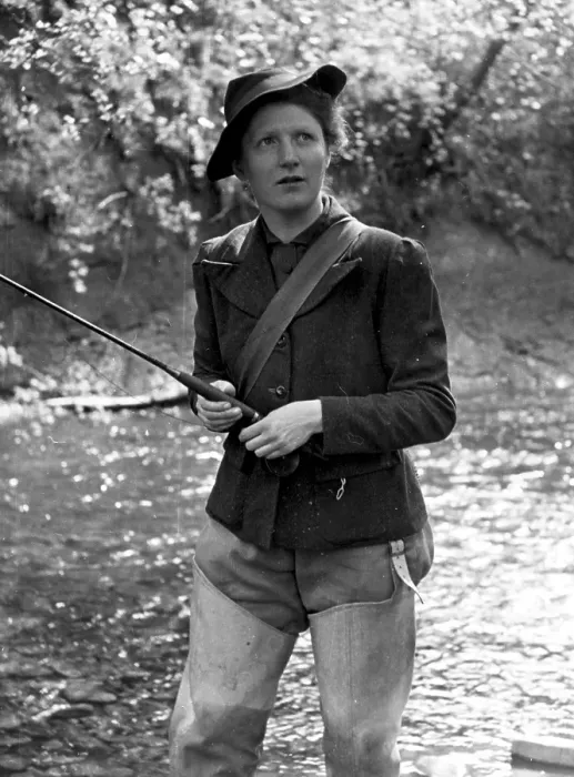 Framed Print : Fishing. 1951: A woman fishing in a river Framed Print : Fishing. 1951: A woman fishing in a river