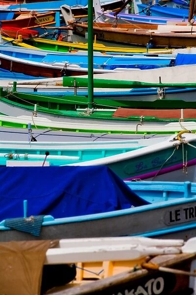 Fishing boats. Colorful fishing boats line in harbor, Nice, France