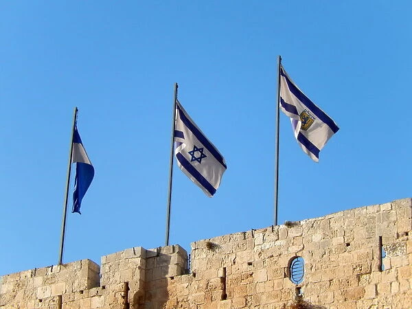 The flag of Israel and Jerusalem on the walls of Jerusalem