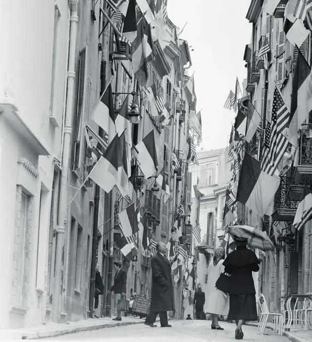 Framed Print : Flags Hanging From Buildings