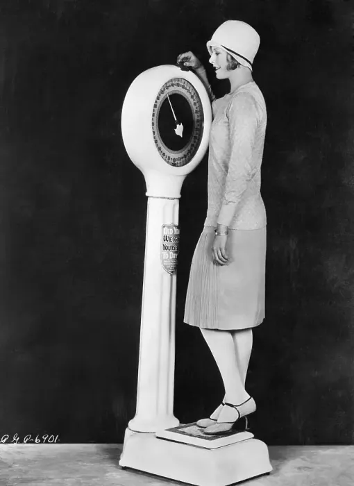 Framed Print : Flapper Weighing Herself on Scale Framed Print : Flapper Weighing Herself on Scale
