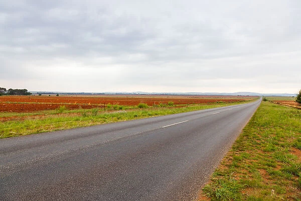 The flat landscape and very red soil farmlands of the Free state, very near to Parys