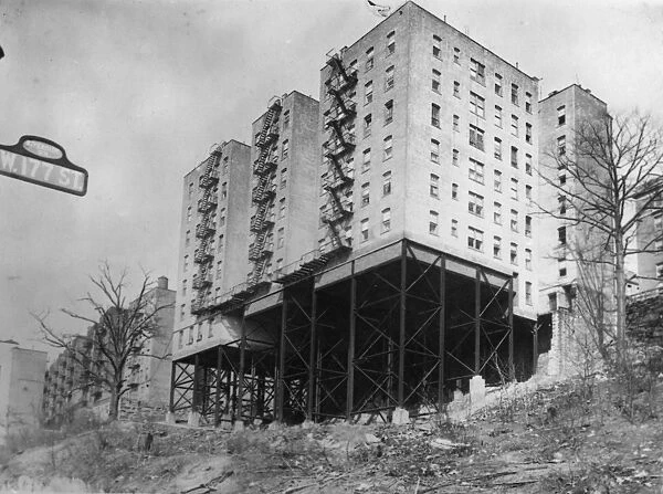 US Flats. April 1926: New housing in New York is constructed on stilts