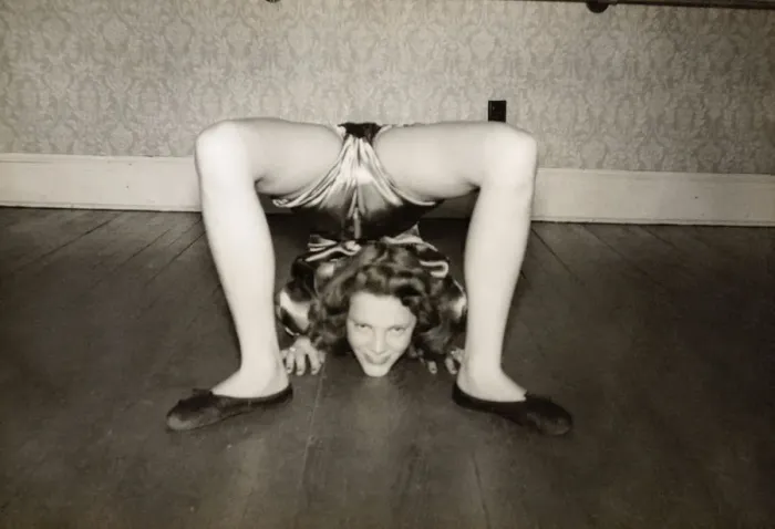 Framed Print : Flexible Woman on the Living Room Floor With Her Legs Over Her Head Framed Print : Flexible Woman on the Living Room Floor With Her Legs Over Her Head