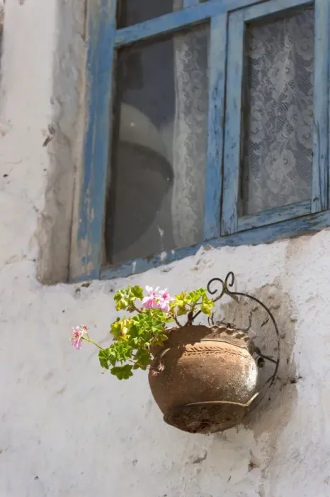 Framed Print : A Flower Pot Mounted On An Exterior Wall Below A Window Framed Print : A Flower Pot Mounted On An Exterior Wall Below A Window
