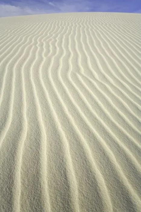 Framed Print : Flowing patterns and shapes created by wind on white gypsum sand dunes Framed Print : Flowing patterns and shapes created by wind on white gypsum sand dunes